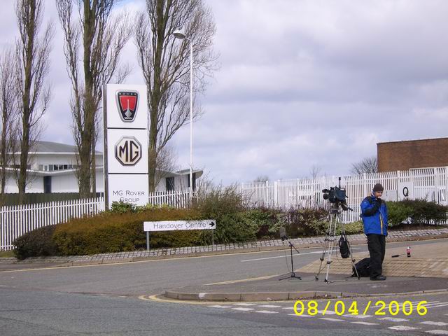 Camera Man Outside Longbridge Motorworks