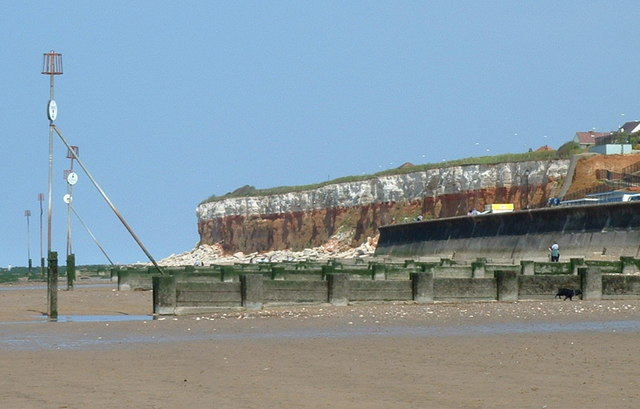 Groynes protecting the beach at... © Andy Peacock cc-by-sa/2.0 ...