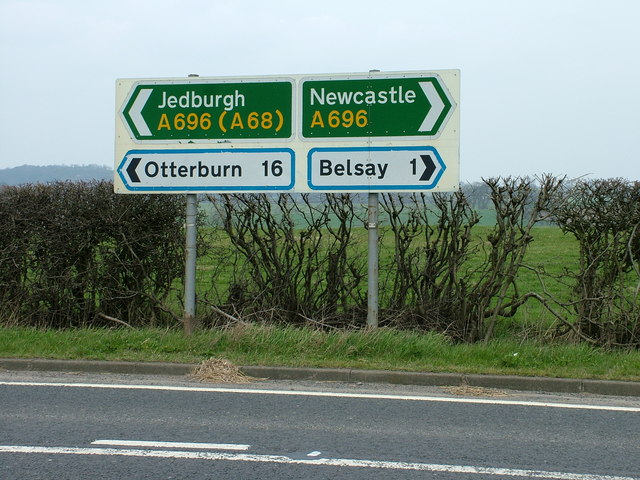 Road signs at the B6309, A696 junction
