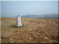 NS6182 : Holehead trig point, Meikle Bin in the background by Chris Wimbush