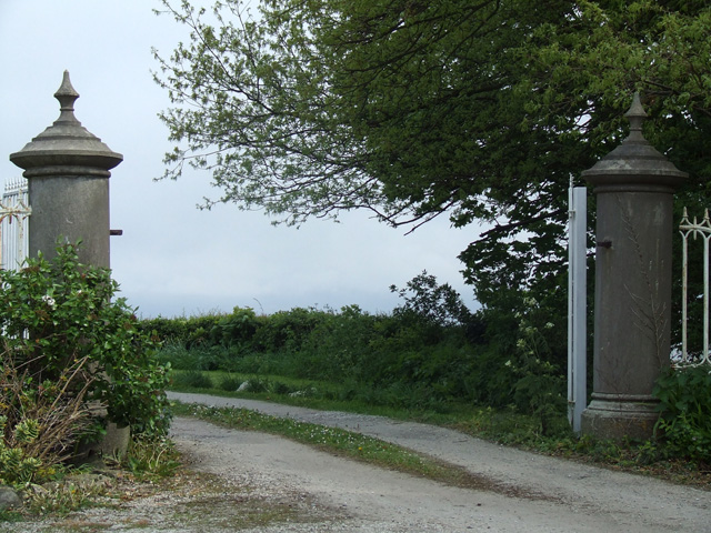 Gate entrance alongside Cornelyn Lodge