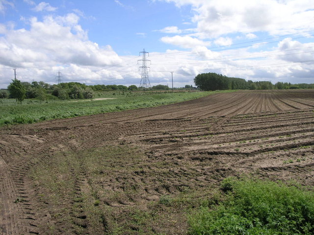 Ploughed Field and Pylons