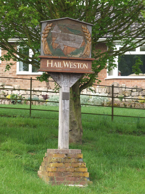 Village nameboard at Hail Weston.