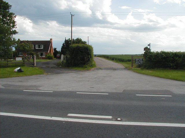 Field and farm entrance