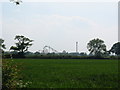 View of Flamingo Land amusement park across agricultural land