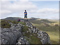 NM6787 : Small crag on open moorland by John Haynes