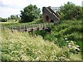 Footbridges over the River Ise and the Midland Railway Line