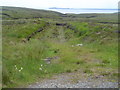 NB5044 : Peat track leading into moorland east of B895 by Donald Lawson