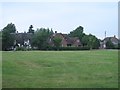 Houses beside the green in Poulshot