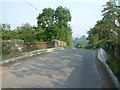 Road bridge over disused railway line