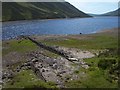 NN6371 : Rails descending into Loch Garry by Lis Burke