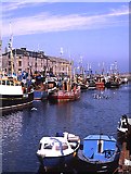 NJ2371 : Lossiemouth Harbour by Anne Burgess