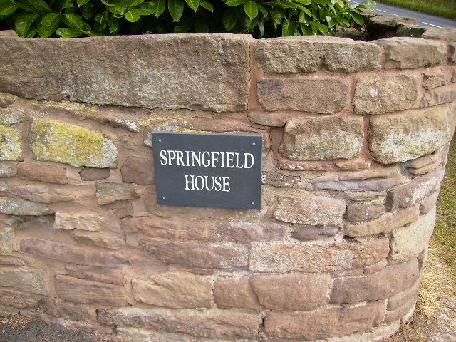 House name on sandstone wall at Springfield House
