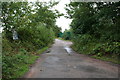 Road and public footpath near Blindley Heath, Surrey