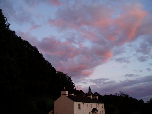 Sunset sky over cottages at Satterthwaite