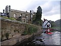 A kayaker paddling along the canal