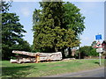 Chainsaw  carved Woodmansterne village sign