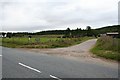 Easter Duthil Farm with Lochgorm Woods in the background.