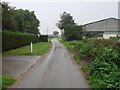 Entering Whitley Thorpe, on Whitley Thorpe Lane,  from the west