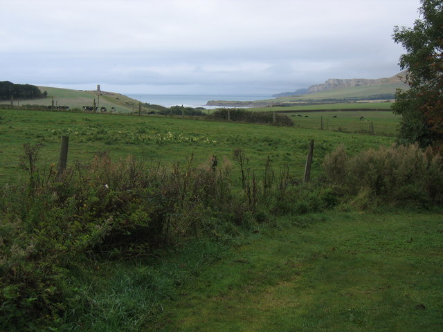View of Clavell Tower and Kimmeridge Bay from footpath leading from Smedmore House