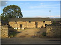 Old farm buildings on south edge of Gretton