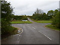 Road junction with A422 at Cranley Oak