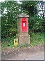 Post box in brick pillar