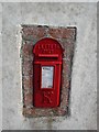 Old postbox in wall