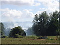 SU9120 : Crops on fire south of Moor Farm by Toby