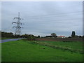 Pylons, with overhead cables crossing the A645 to the east of the junction with Long Lane.