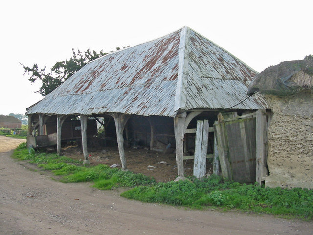 Old cart shed with modern roof