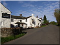 NY4526 : The Horse and Farrier, Dacre village by Humphrey Bolton