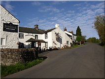NY4526 : The Horse and Farrier, Dacre village by Humphrey Bolton