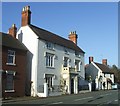 Large and small white houses