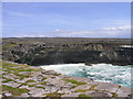 L8707 : Sea cliffs, east of Ducathair Castle, Inishmore by Francoise Poncelet