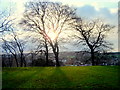 Setting sun over the motte on Bailey Hill in Mold