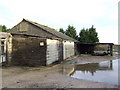 Old farm buildings near Wanborough House