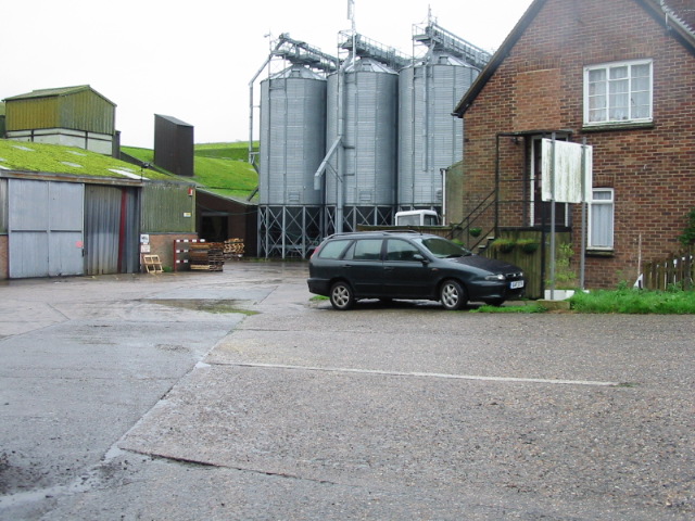 Grain silos and moss covered roof 'Grain Harvesters Ltd'