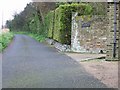 View of lane and house entrance looking N towards A299