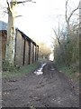 Track twixt barn and wood