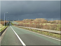 SK2830 : Storm clouds over the A50 by John Poyser