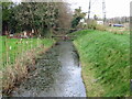 View of ditch and pylon from Hay Lane.