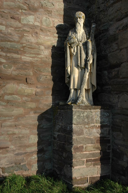 Statue below the tower of Bridge Sollers church