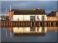 Cyclist and pedestrian by River Exe