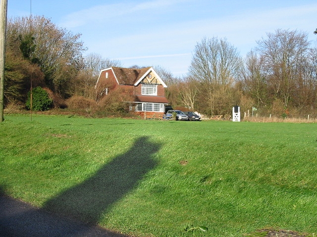 House overlooking village green, Woolage Village