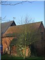 Farm buildings with weathervane