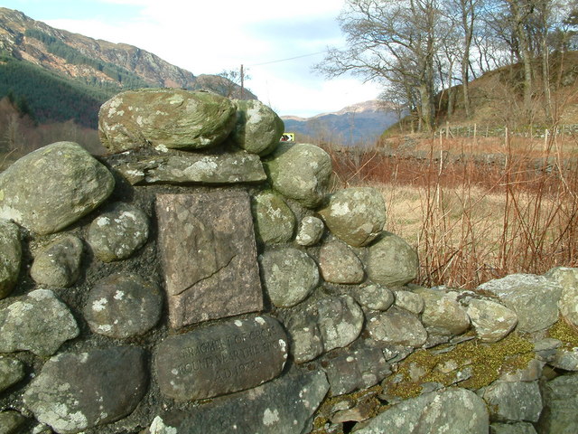 Fragment of cross set into wall of enclosure for St Bride's Chapel