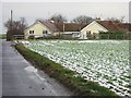 House and field margin near Grove Road