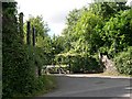 Overgrown disused entrance to closed tourist attraction