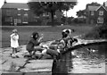 SD8915 : Fishing, etc., in Syke Pond, Rochdale, Lancashire by Dr Neil Clifton